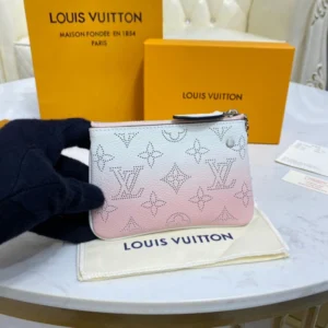 Key ring Louis Vuitton Key Pouch in Pink Gradient Mahina Perforated Leather